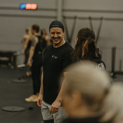 coach smiling at CrossFit 749